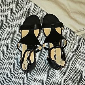 Black and tan leather sandals